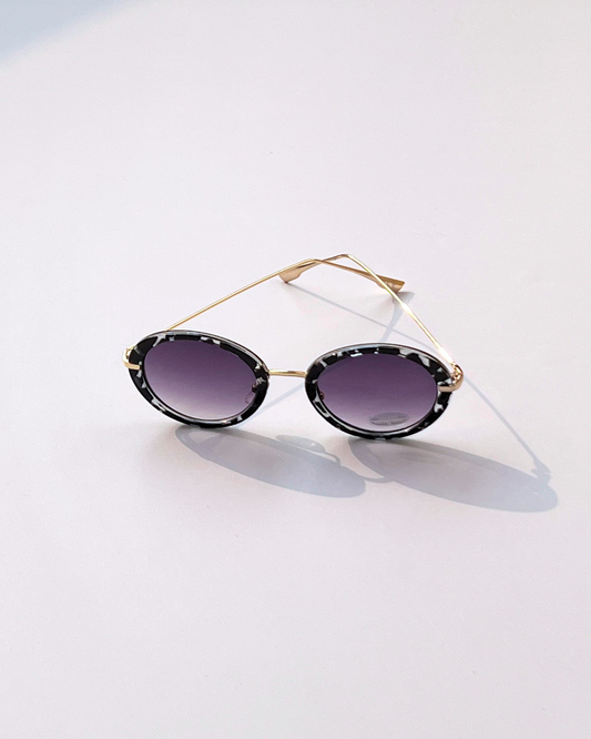 Oval Geometric Sunglasses – Black & White Frame with Purple Lenses